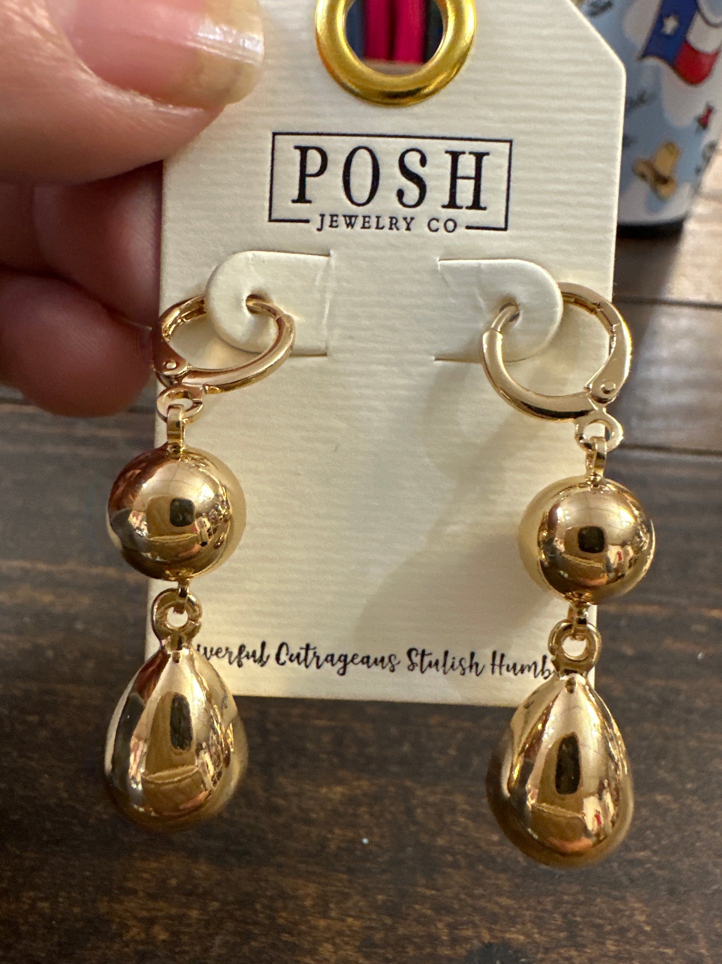 Gold finial ear