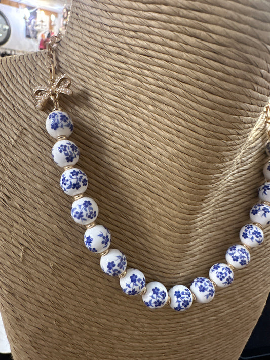 Porcelain bow necklace