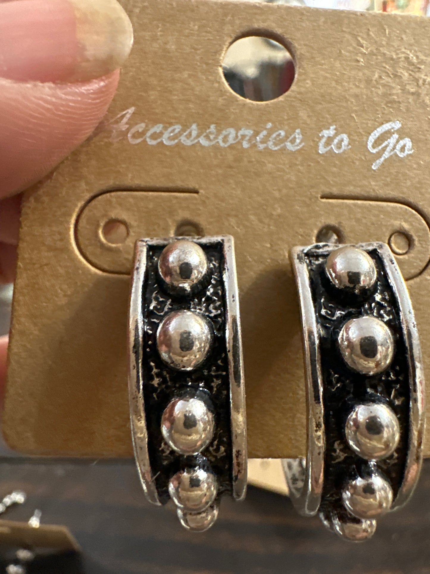 Silver knotted ear