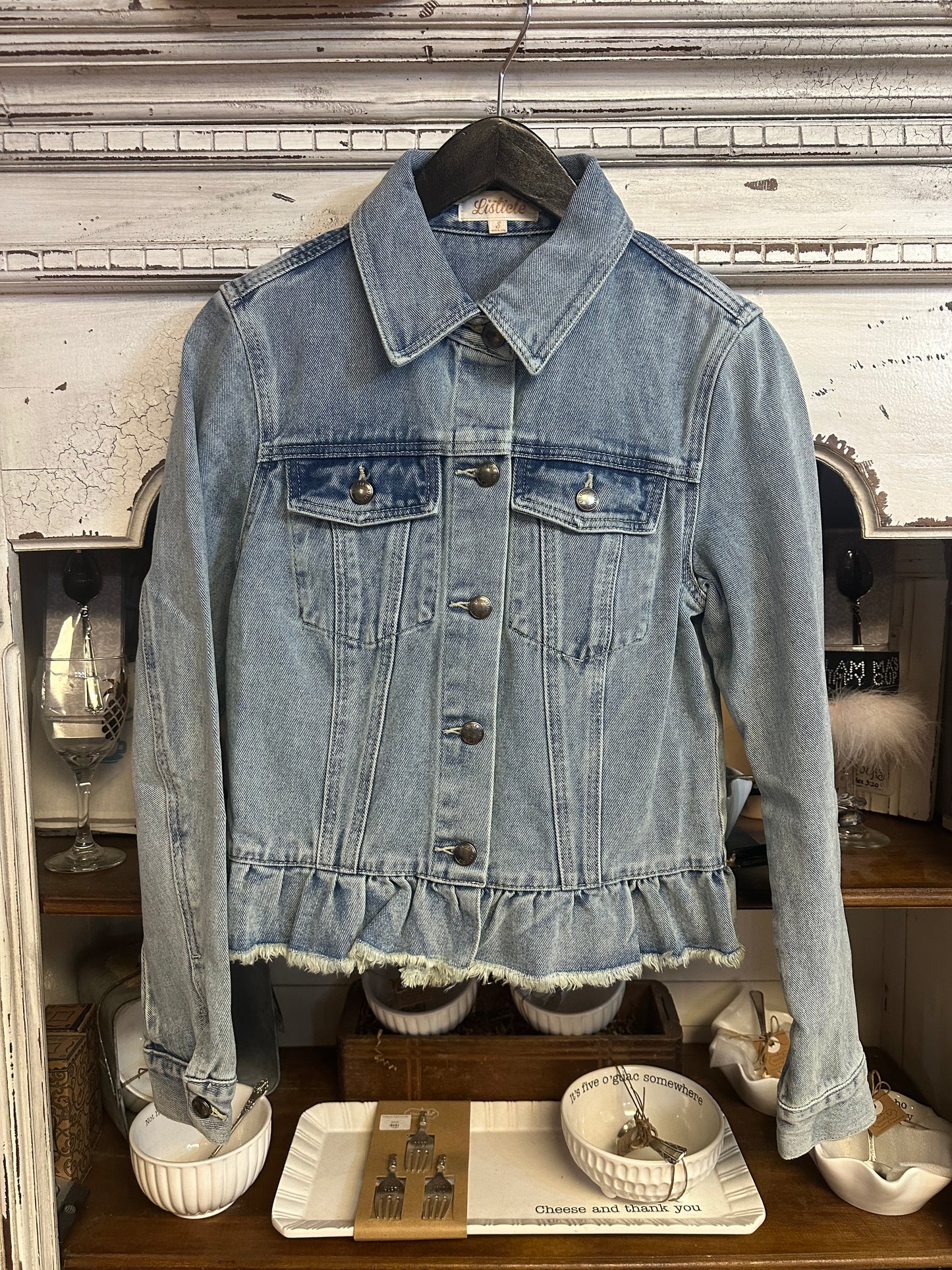 Denim ruffle bottom jacket
